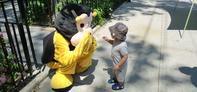 Honey Tomes mascot buzzing around a recent event. <a href="http://www.honeytomes.com/?page_id=364"><font color="ffcc33"> See upcoming events</font></a> <br> slide1